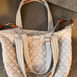 - MZ Wallace medium Sutton. Light gray. No pouch. Light staining on handle.